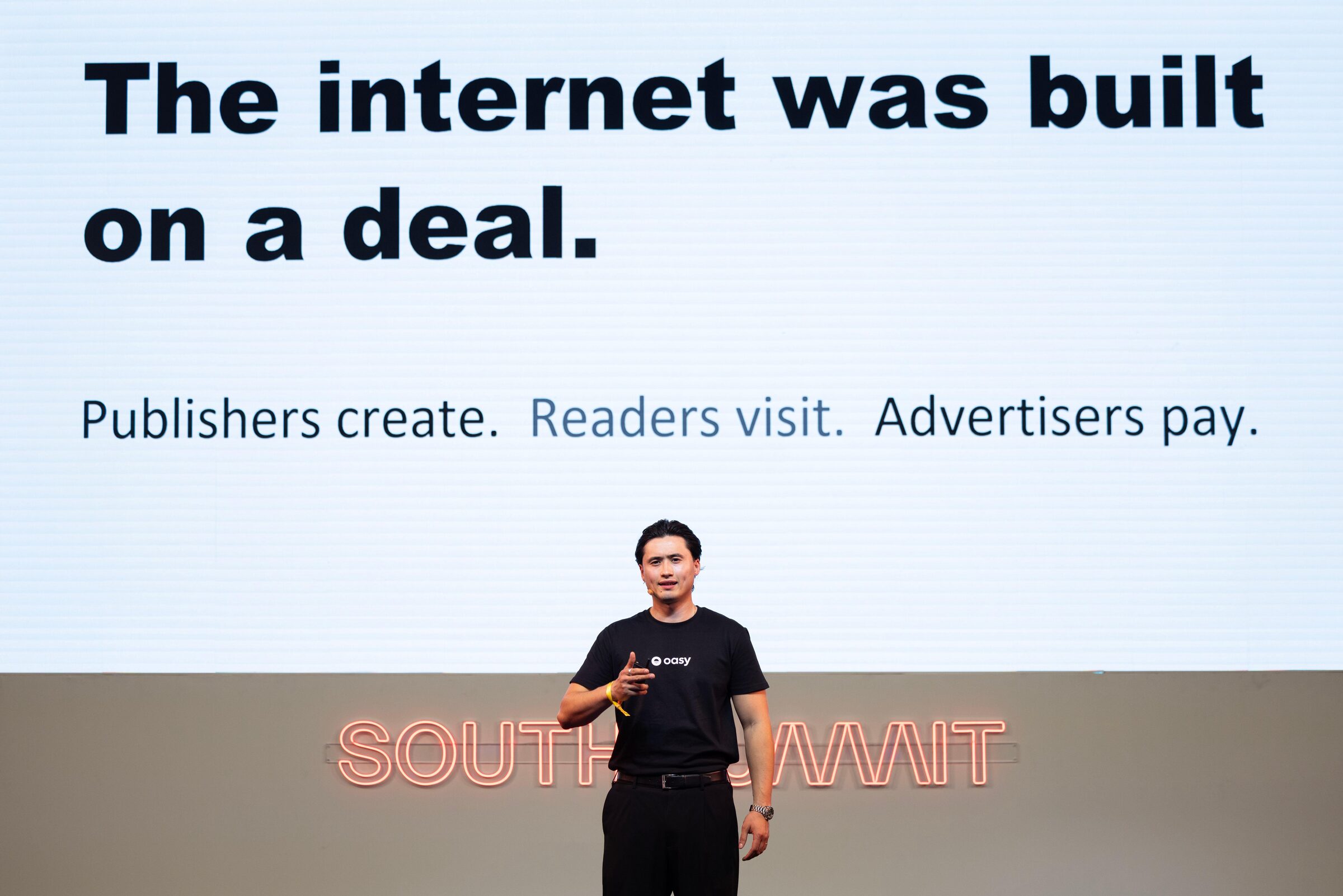 Choy Travers speaking on stage at South Summit